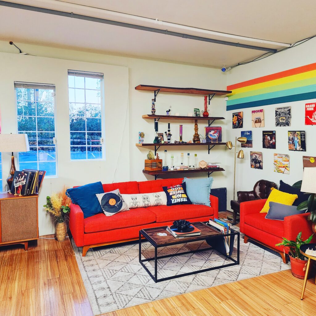 The coral sofa and vinyl counters inside One Hit Wonder Port Townsend